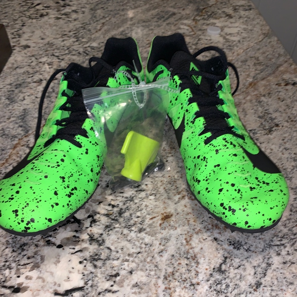 Nike track shoes brand new with spikes and tool